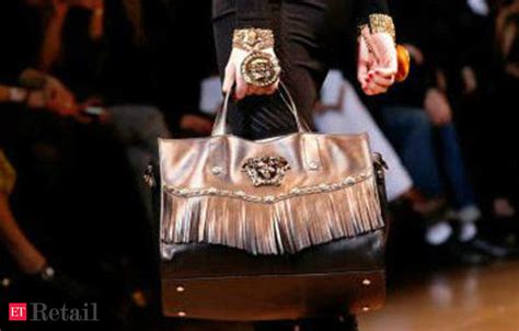 blackstone buys versace